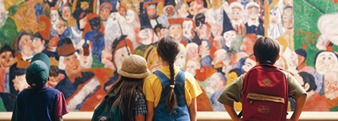Children looking at <em>Christ's Entry into Brussels in 1889</em>, 1888, James Ensor. Oil on canvas. The J. Paul Getty Museum. © 2017 Artists Rights Society (ARS), New York / SABAM, Brussels Ways to Give