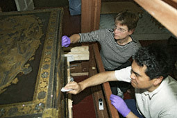 Conservators at work on the Mazarin Chest