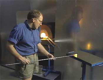 Preparing glass for free blowing
