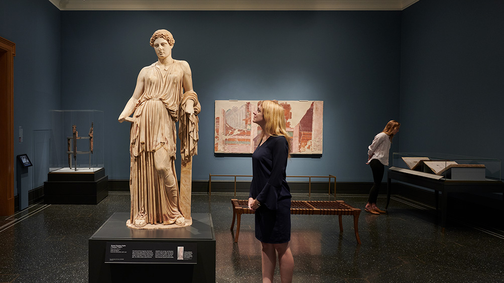 Gallery view: in the foreground, Woman Wearing a Peplos (“Demeter”/”Hera”), Roman, first century AD. Courtesy Parco Archeologico di Ercolano