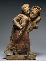 Antefix in the Form of a Maenad and Satyr Dancing
