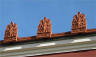 antefixes on the roof of the Getty Villa