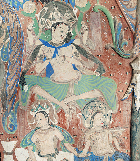 The three-headed, multi-armed Hindu deity Narayana appears seated above two other deities
