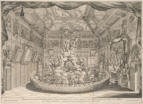 Enormous sculptural centerpiece at an elaborate banquet table in the round