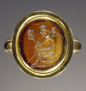 Gem engraved with Pan gazing at a mask / Roman