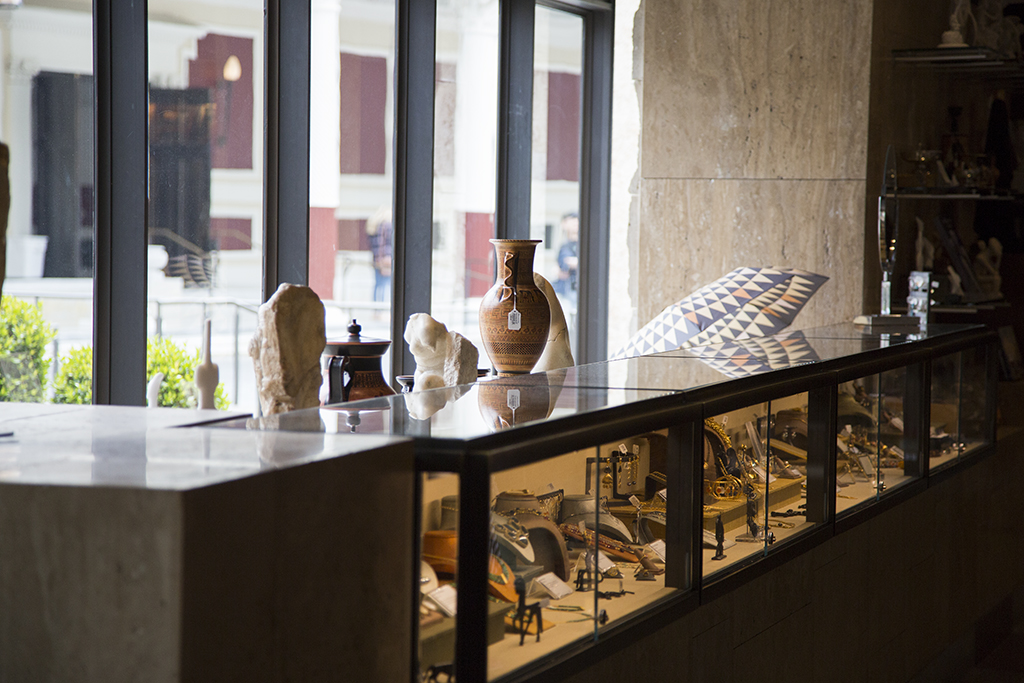 Two visitors browse jewelry in the shop at the Getty Villa