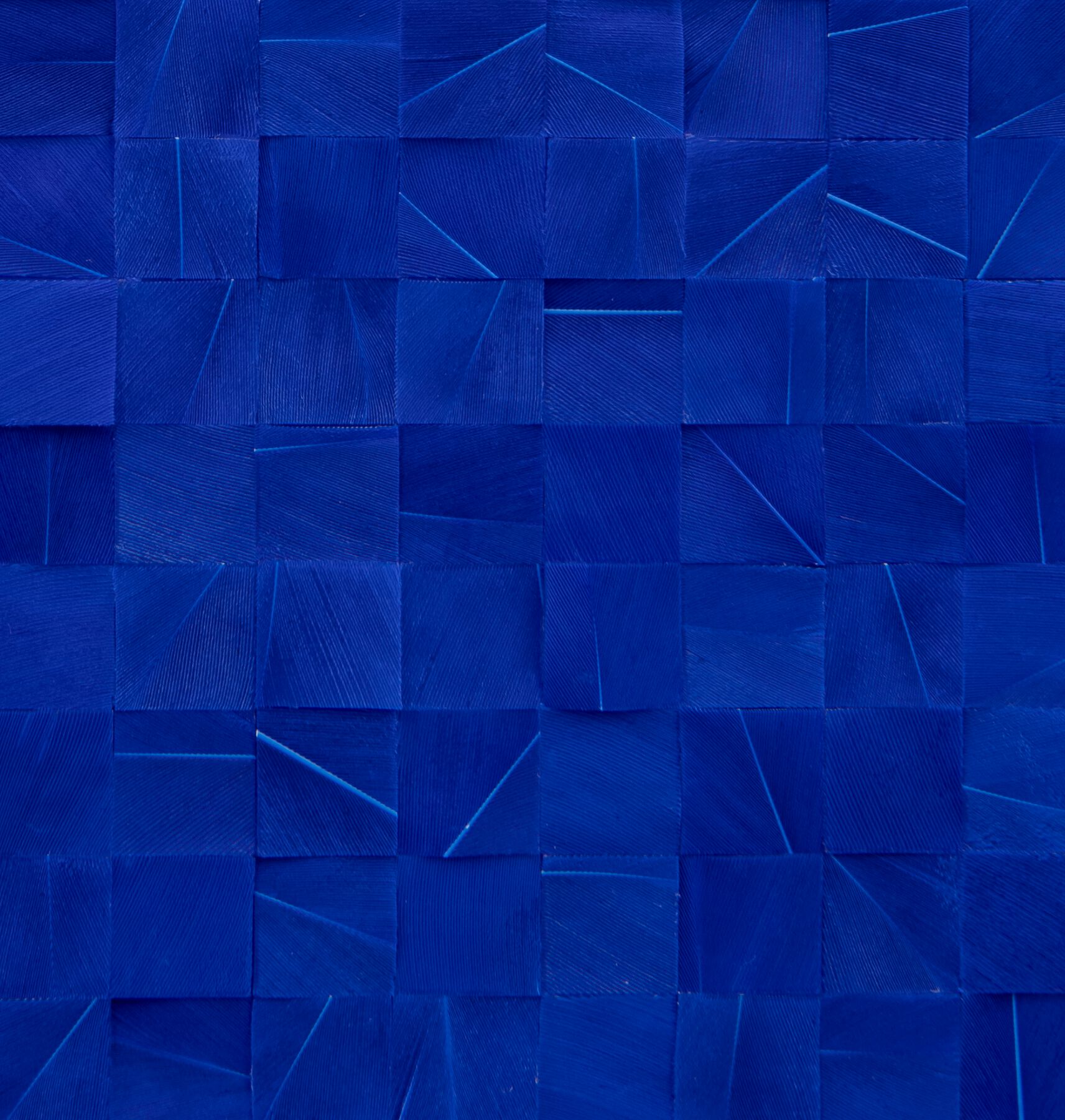 Eight-by-eight grid of royal blue rectangles with light blue lines running through each in varied angles