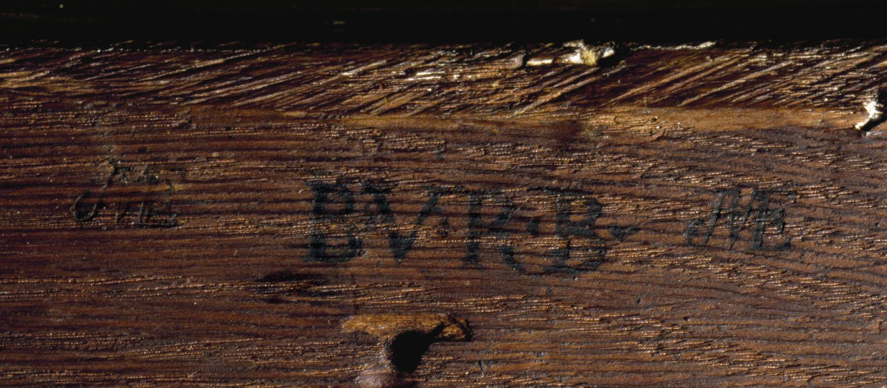 remnants of imprinted stamps are visible underneath one of the drawers