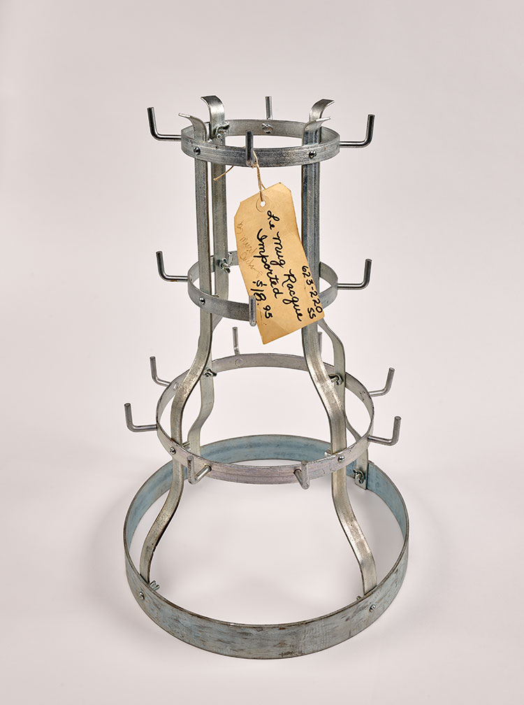 photo of a metal mug rack by Jean Brown, after Marcel Duchamp
